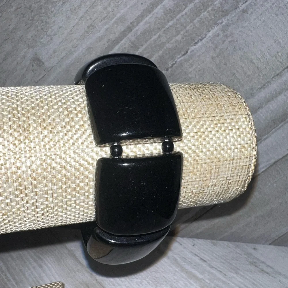 4 black bracelets